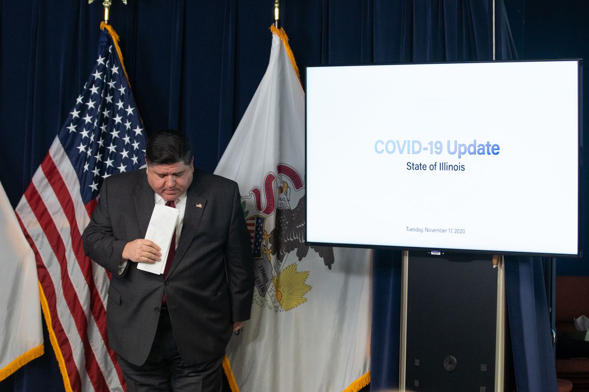 Gov. J.B. Pritzker attends a news conference at the James R. Thompson Center in the Loop on Tuesday.