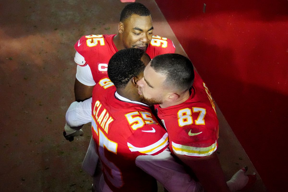 Chris Jones #95, Frank Clark #55 and Travis Kelce #87 of the Kansas City Chiefs celebrate after defeating the Jacksonville Jaguars in the AFC Divisional Playoff game at Arrowhead Stadium on January 21, 2023 in Kansas City, Missouri. The Kansas City Chiefs defeated the Jacksonville Jaguars with a score of 27 to 20.