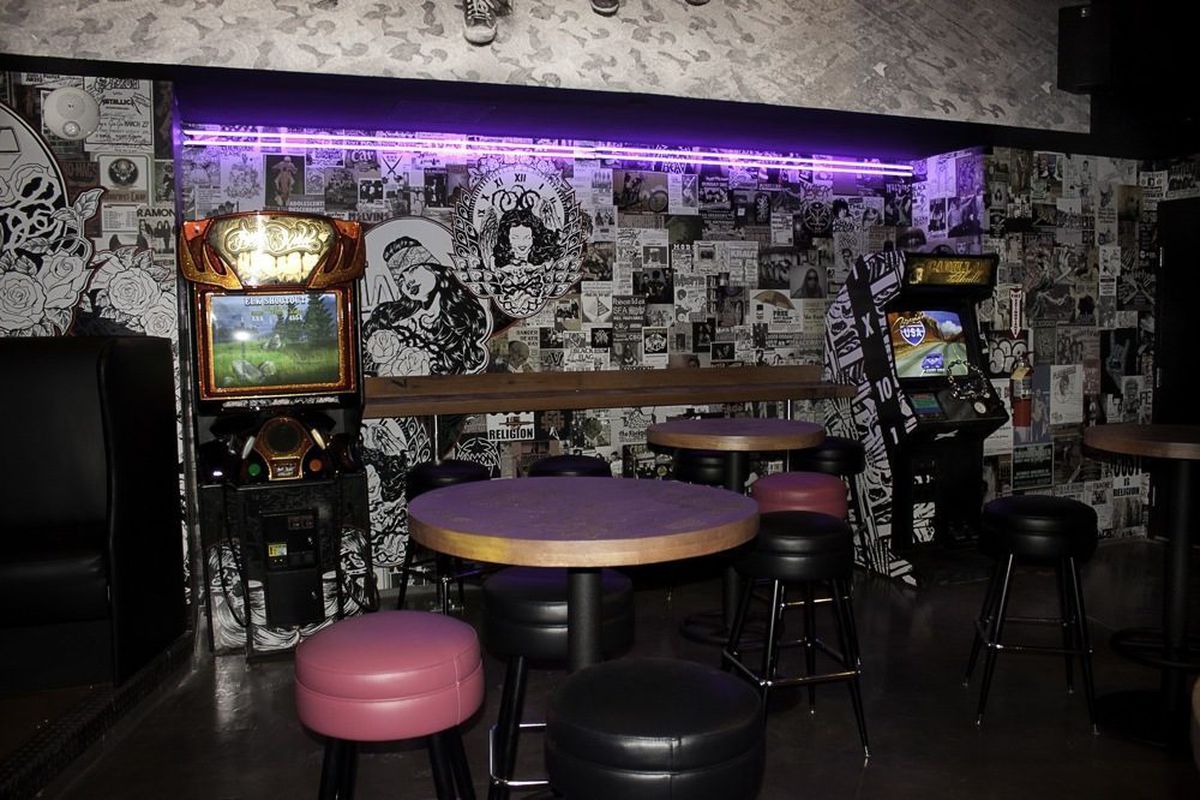 Graffiti artist Defer created the punk rock poster wall in the game room at Rattlecan. 