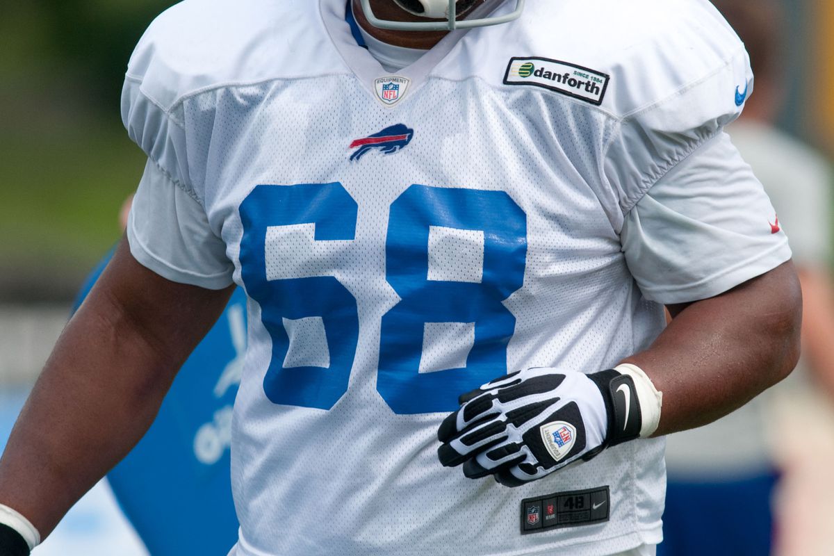 August 13, 2012; Pittsford, NY, USA; Buffalo Bills guard Keith Williams (68) in line drills during training camp at St. John Fisher College.  Mandatory Credit: Mark Konezny-US PRESSWIRE