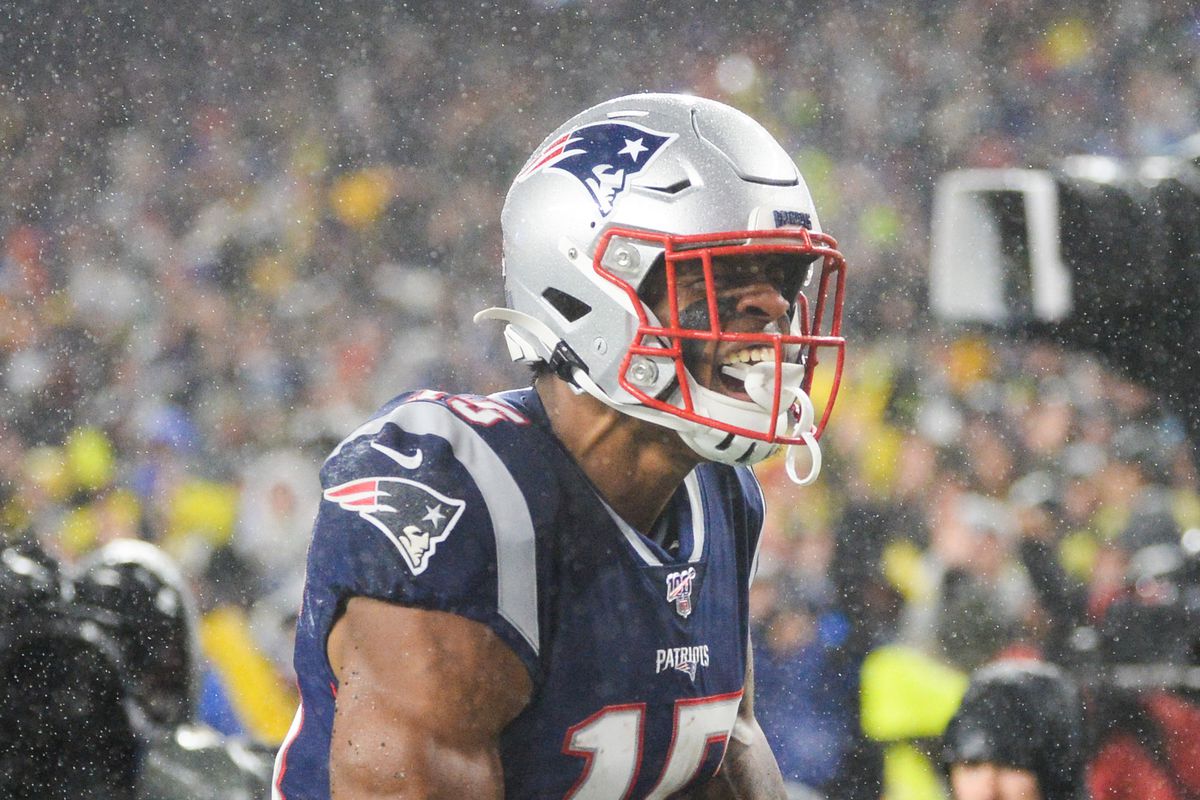 N’Keal Harry of the New England Patriots celebrates scoring a touchdown during the first quarter against the Dallas Cowboys in the game at Gillette Stadium on November 24, 2019 in Foxborough, Massachusetts.