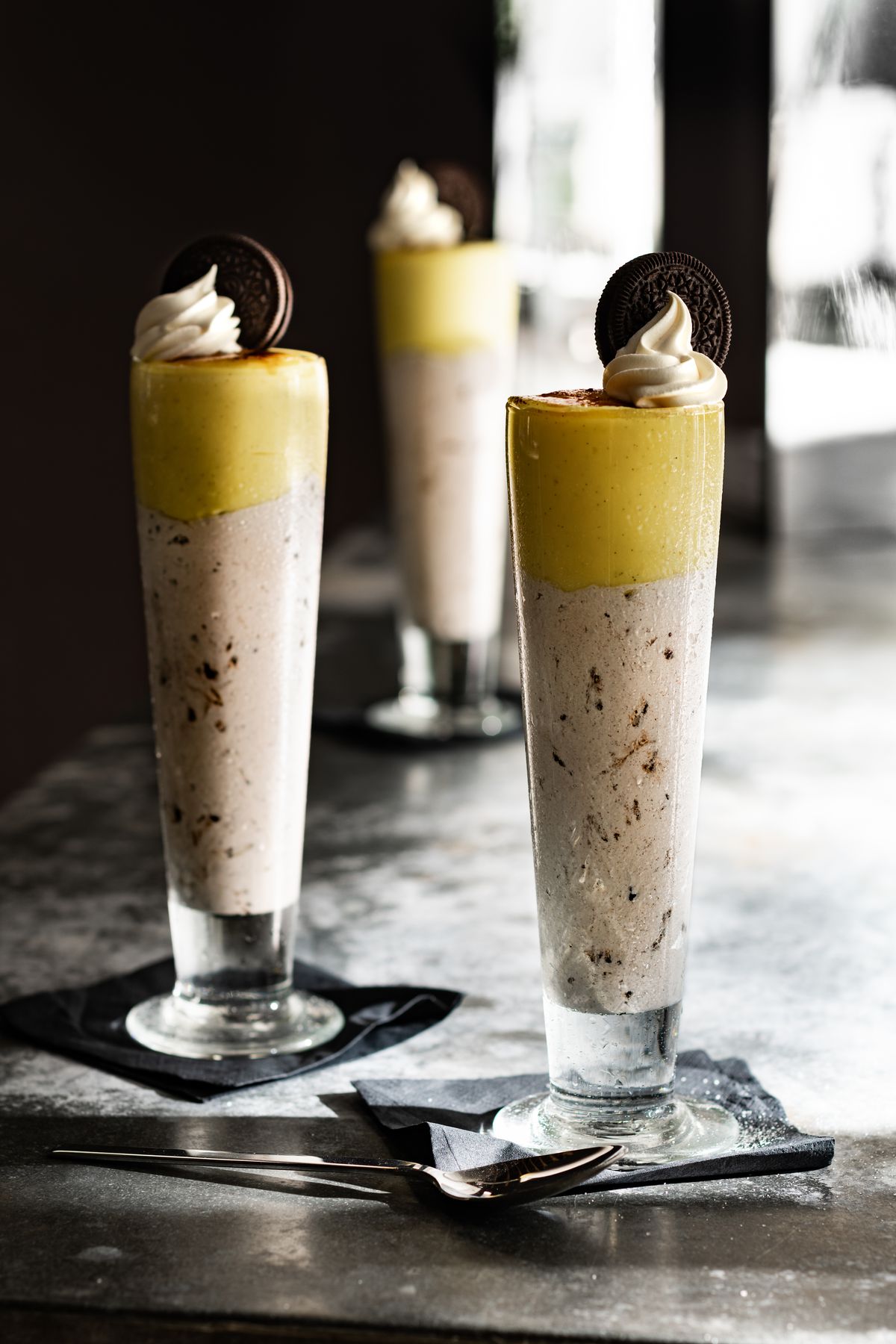 The Oreo Creme Brulee Shake is topped with a layer of crème brûlée and whipped cream.