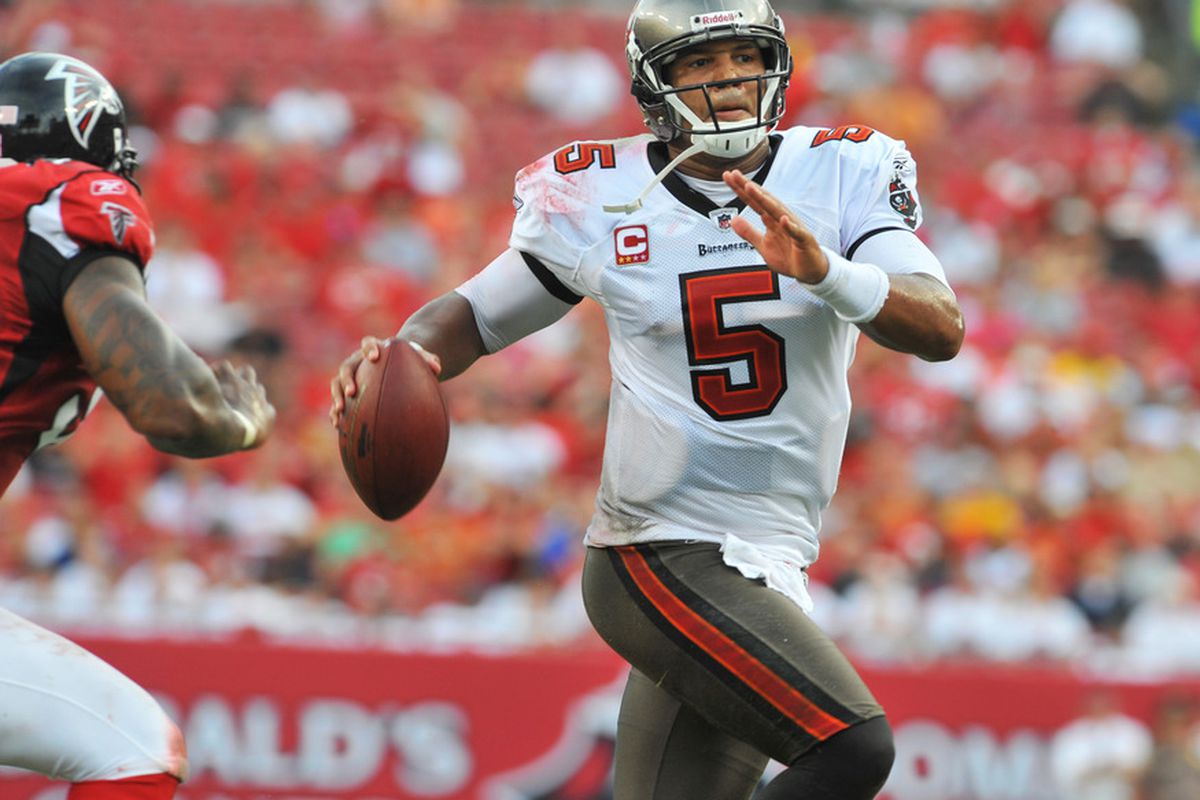 TAMPA, FL - SEPTEMBER 25:  Quarterback Josh Freeman #5 of the Tampa Bay Buccaneers looks to pass against the Atlanta Falcons  September 25, 2011 at Raymond James Stadium in Tampa, Florida. (Photo by Al Messerschmidt/Getty Images)