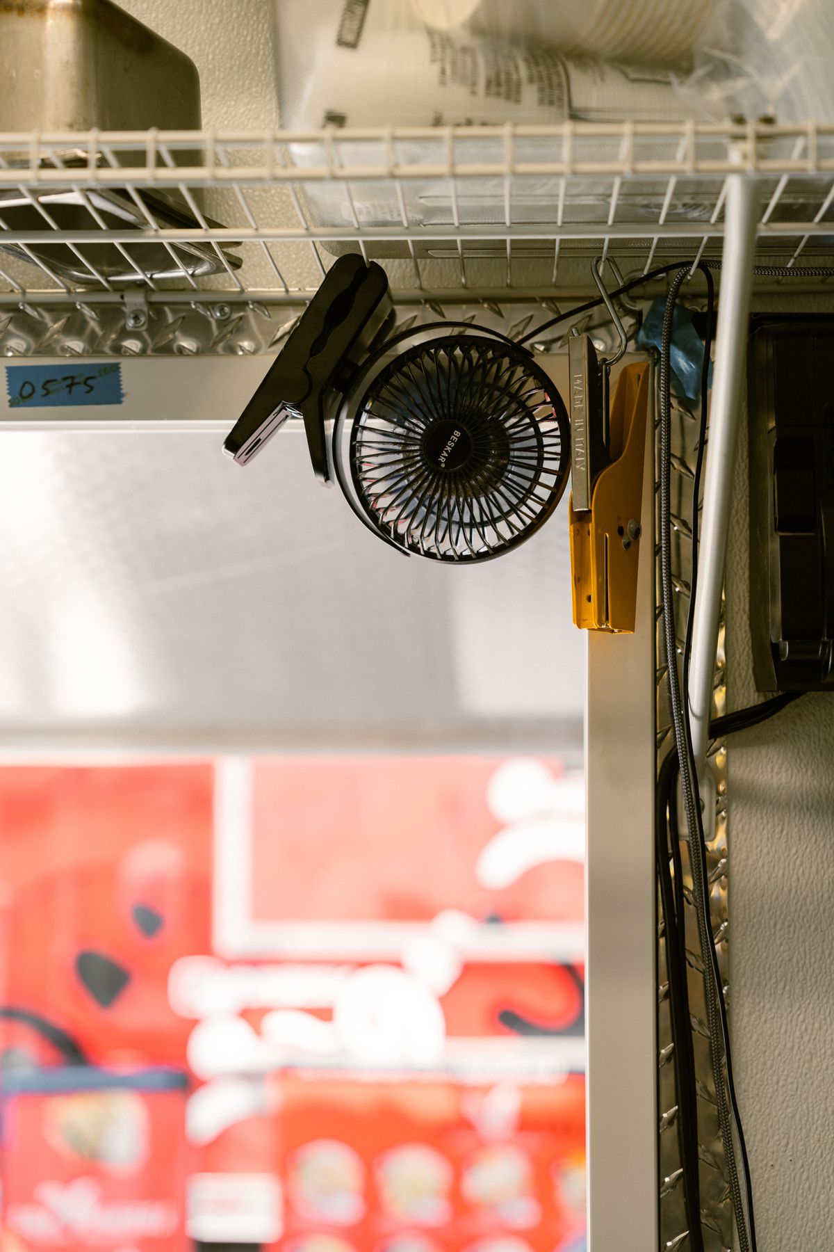 A mounted fan at Frybaby.