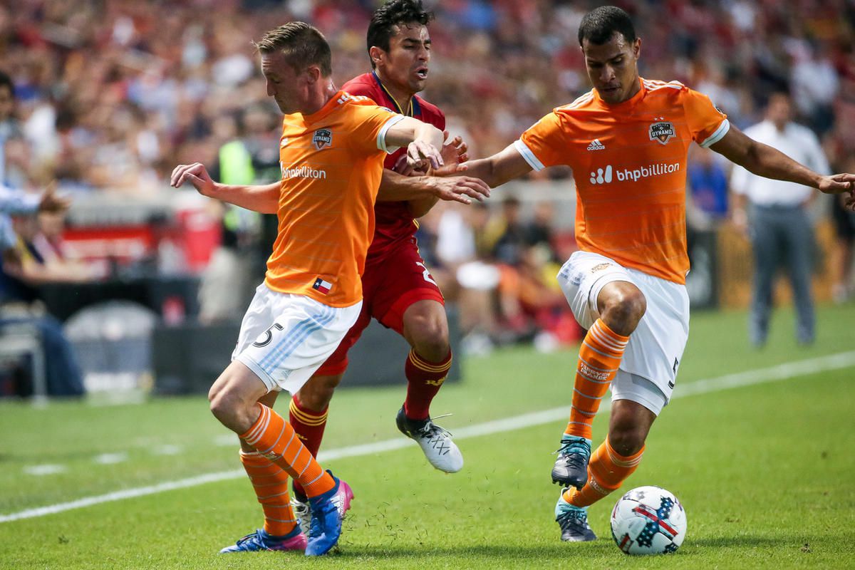 Real Salt Lake defender Tony Beltran (2) moves between Houston Dynamo defender Dylan Remick (15) and midfielder Juan David Cabezas (5) during a match at Rio Tinto Stadium in Sandy on Saturday, Aug. 5, 2017.