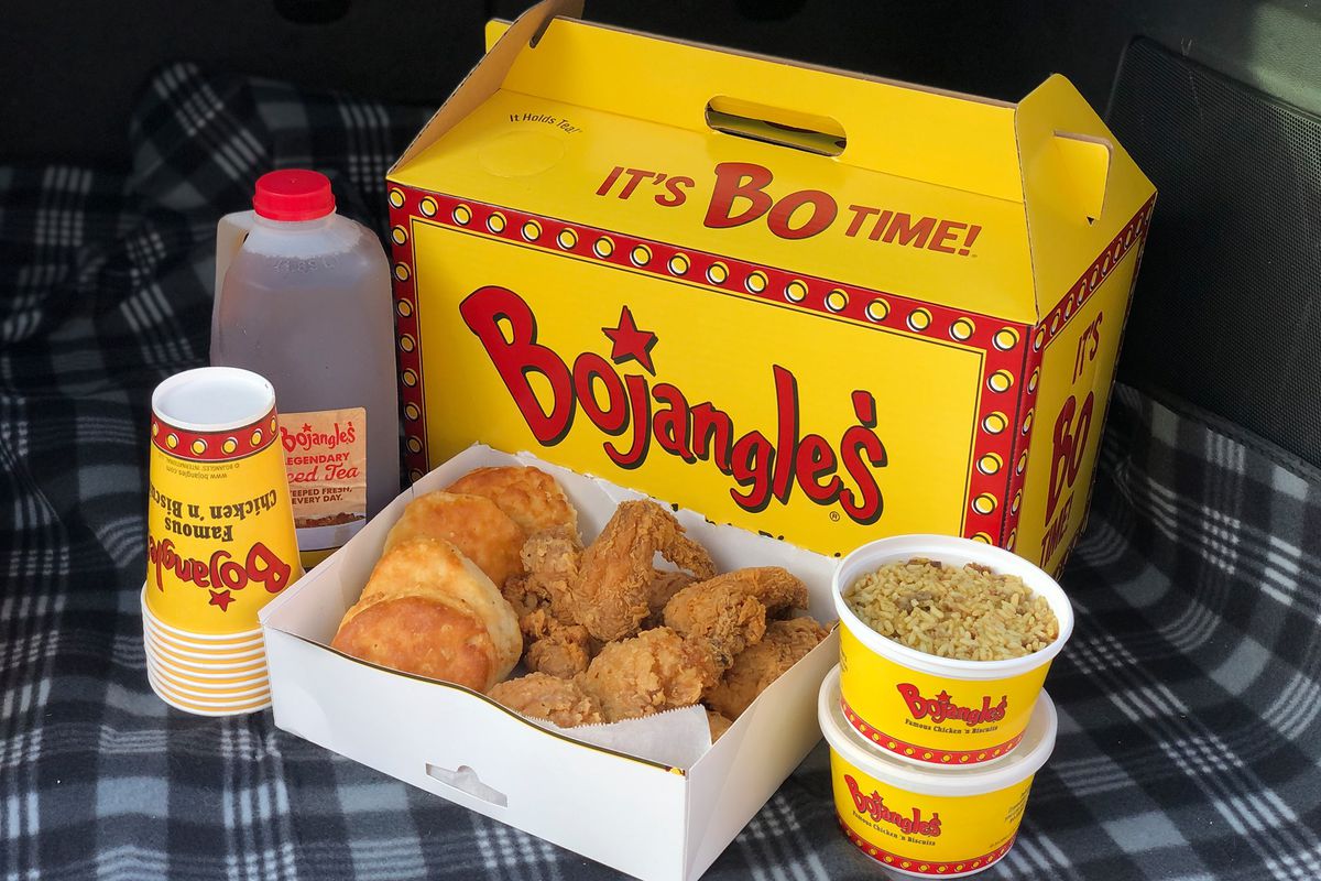 a spread of fried chicken, dirty rice and tea from Bojangles,