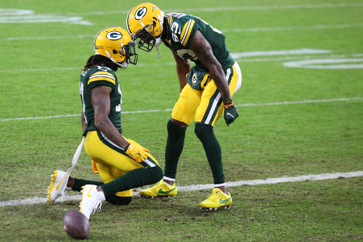 Green Bay Packers wide receiver Marquez Valdes-Scantling (83) celebrates with Green Bay Packers wide receiver Davante Adams (17) during a NFL Divisional Playoff game between the Green Bay Packers and the Los Angeles Rams at Lambeau Field on January 16, 2021 in Green Bay, WI.