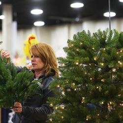 Jackie Bourne assembles her Christmas tree in preparation for the Festival of Trees at the South Towne Center in Sandy on Monday, Nov. 28, 2016. The festival runs Wednesday, Nov. 30 through Saturday, Dec. 3, from 10 a.m. to 10 p.m. each day.
