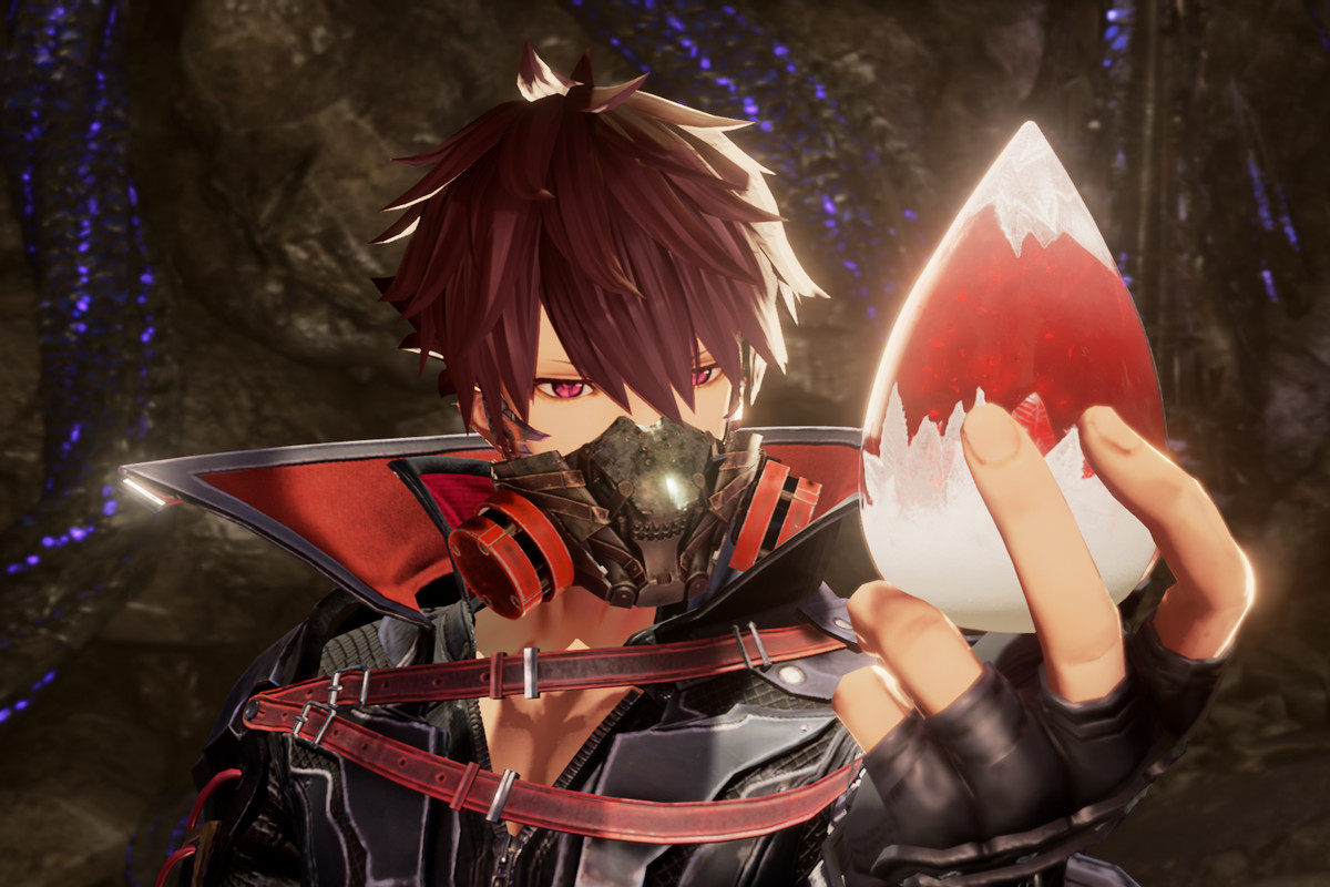 A Code Vein character holds up a blood droplet