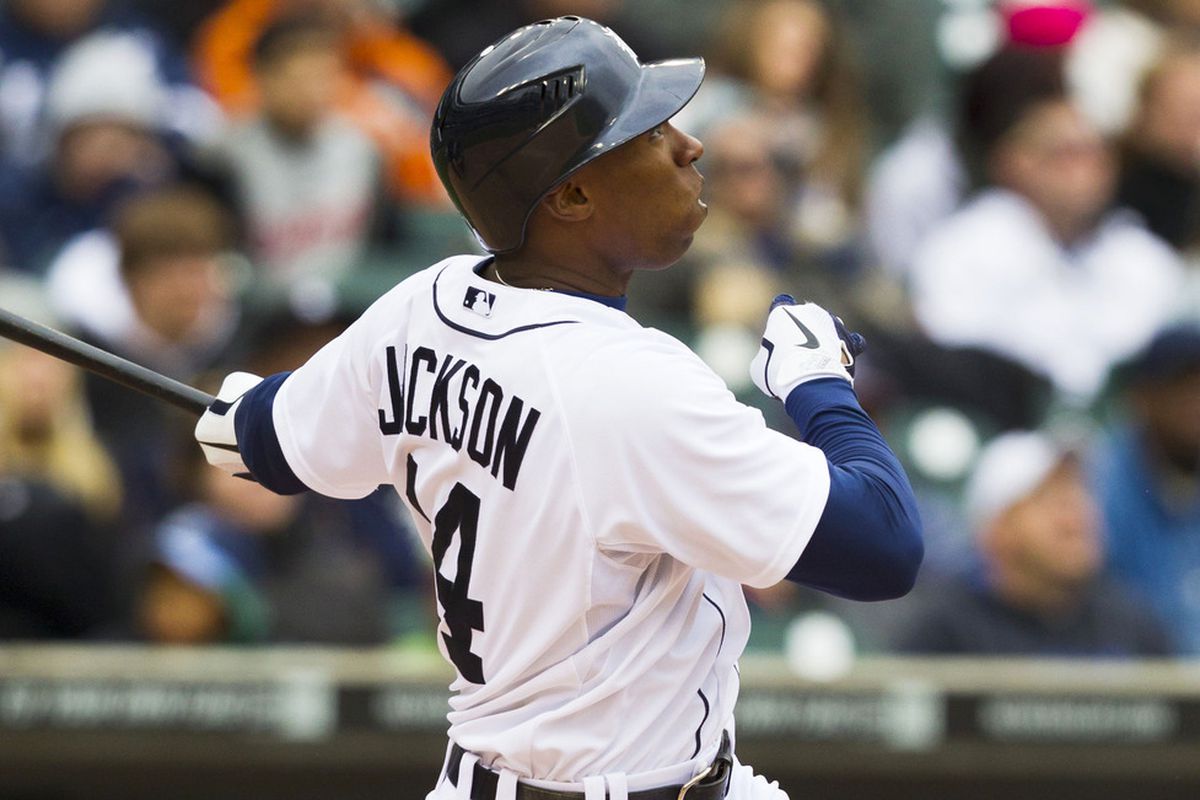 April 10, 2012; Detroit, MI, USA; Detroit Tigers center fielder Austin Jackson (14) hits a home run during the seventh inning against the Tampa Bay Rays at Comerica Park. Mandatory Credit: Rick Osentoski-US PRESSWIRE