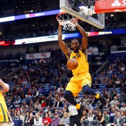 Utah Jazz forward Derrick Favors (15) slam dunks in the second half of an NBA basketball game against the New Orleans Pelicans in New Orleans, Monday, Feb. 5, 2018. The Jazz won 133-109. (AP Photo/Gerald Herbert)