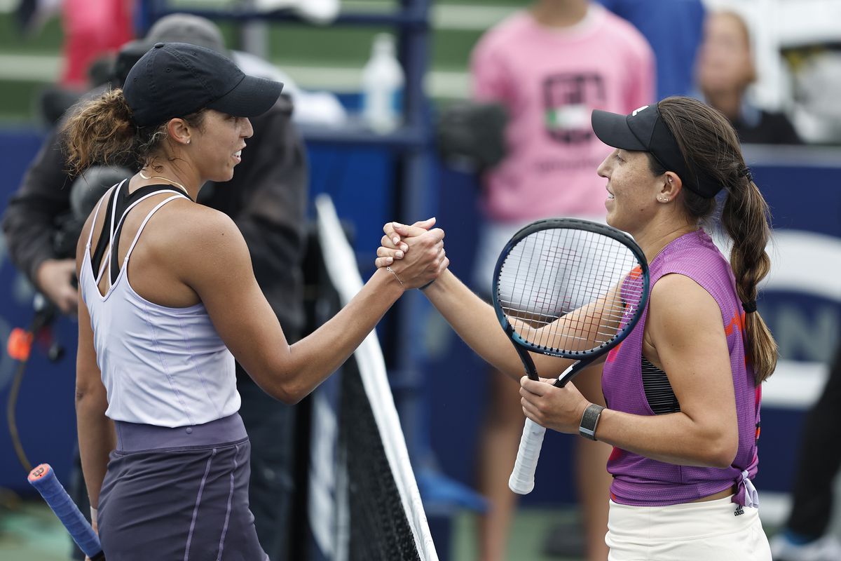 Jessica Pegula of the United States meets with Madison Keys of the United States after her win during Day 5 of the San Diego Open, part of the Hologic WTA Tour, at Barnes Tennis Center on October 14, 2022 in San Diego, California.
