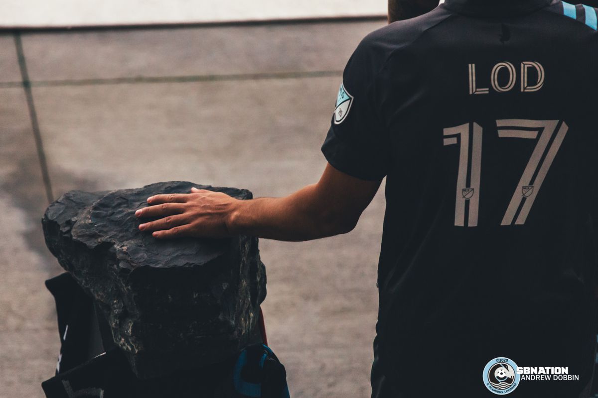 September 6, 2020 - Saint Paul, Minnesota, United States - Minnesota United midfielder Robin Lod (17) places his hand on the rock mined from the Iron Range before walking out to take on Real Salt Lake at Allianz Field. 

