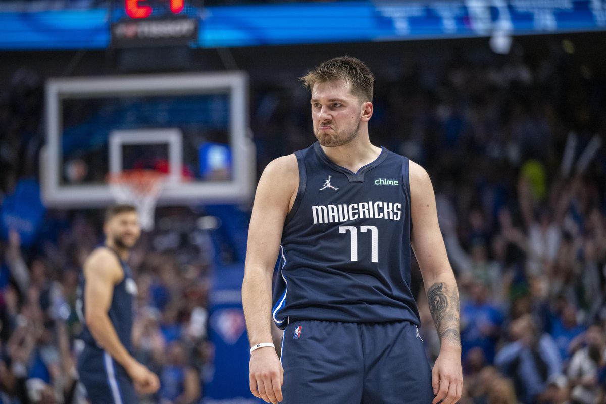 Dallas Mavericks guard Luka Doncic (77) celebrates making a basket against the Utah Jazz during the third quarter in game five of the first round for the 2022 NBA playoffs at American Airlines Center.