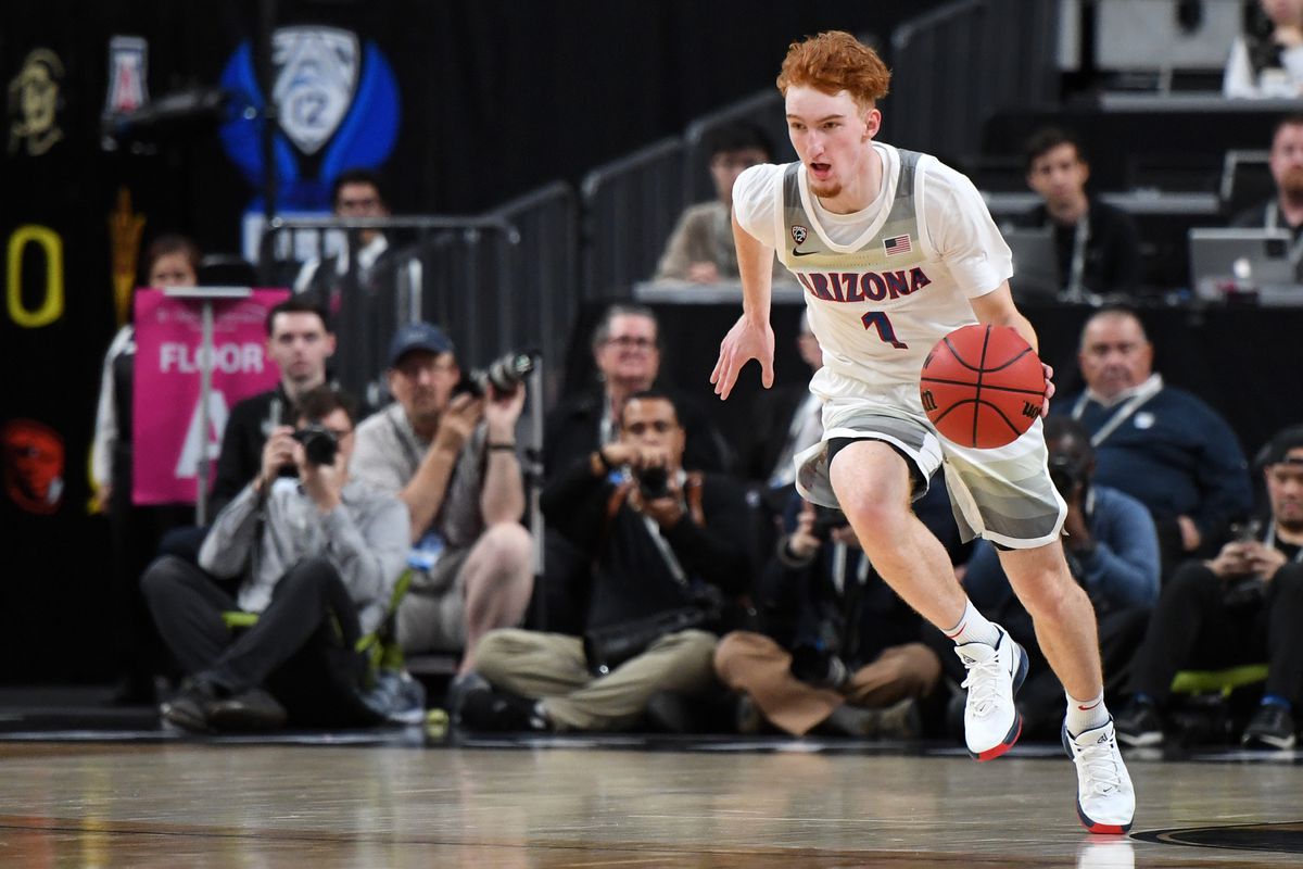 Photo by Ethan Miller/Getty Images. arizona-wildcats-nico-mannion-analysis-...