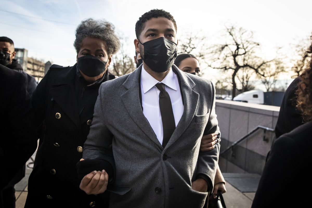Flanked by family members, supporters, attorneys and bodyguards, former “Empire” star Jussie Smollett walks into the Leighton Criminal Courthouse, Thursday morning, Dec. 2, 2021. The 39-year-old actor and singer is charged with lying to Chicago police in 2019 when he claimed he was the victim of a racist and anti-gay attack near his Streeterville apartment.