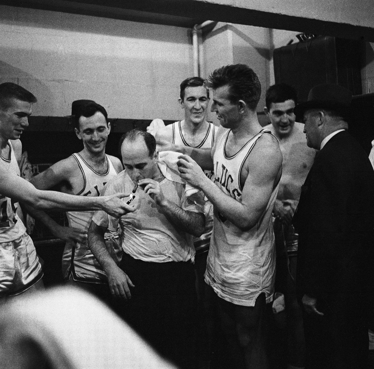 Bob Cousy and Teammates Celebrate Victory