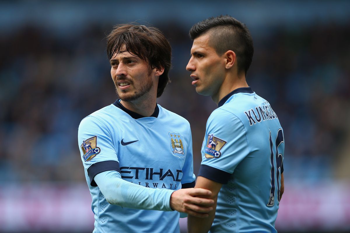 David Silva and Sergio Aguero of Manchester City look on during the Barclays Premier League match between Manchester City and Queens Park Rangers at Etihad Stadium on May 10, 2015 in Manchester, England.