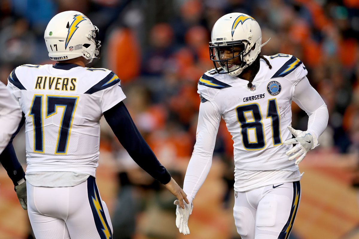 Quarterback Philip Rivers #17 and wide receiver Mike Williams #81 of the Los Angeles Chargers celebrate a touchdown against the Denver Broncos at Broncos Stadium at Mile High on December 30, 2018 in Denver, Colorado.