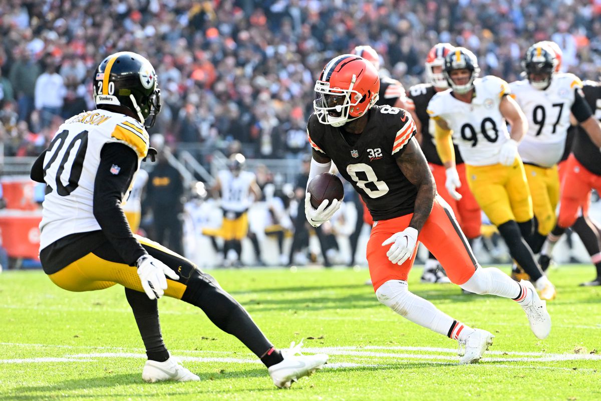 Elijah Moore of the Cleveland Browns carries the ball during the first half against the Pittsburgh Steelers at Cleveland Browns Stadium on November 19, 2023 in Cleveland, Ohio.