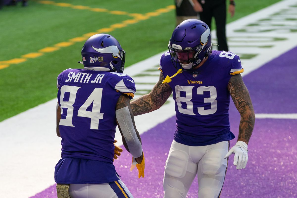 Minnesota Vikings tight end Irv Smith (84) celebrates his touchdown with tight end Tyler Conklin (83) in the first quarter against the Detroit Lions at U.S. Bank Stadium.