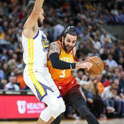 Utah Jazz guard Ricky Rubio (3) drives against Golden State Warriors guard Stephen Curry (30) at Vivint Arena in Salt Lake City on Tuesday, Jan. 30, 2018.