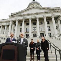 Equality Utah Executive Director Troy Williams and Board Chairman Clifford Rosky speak regarding legislative bill protections in housing, employment, and other areas for LGBT people during a press conference at the state Capitol in Salt Lake City Tuesday, Jan. 27, 2015. 