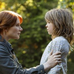 Bryce Dallas Howard is Grace and Oakes Fegley is Pete in Disney's “Pete's Dragon," the adventure of an orphaned boy and his best friend Elliot, who just so happens to be a dragon.