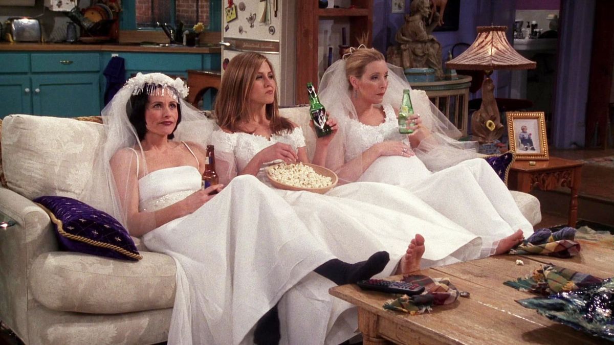 Courteney Cox as Monica Geller, Jennifer Aniston as Rachel Green, and Lisa Kudrow as Phoebe Buffay in season 4, episode 20 of Friends, “The One With All the Wedding Dresses.”