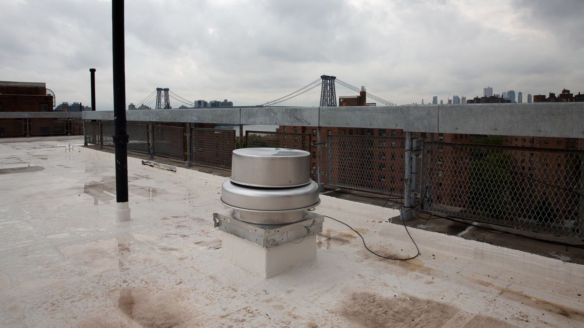 NYCHA installed a ventilation fan on the roof of a Wald Houses building, Aug. 19, 2020.