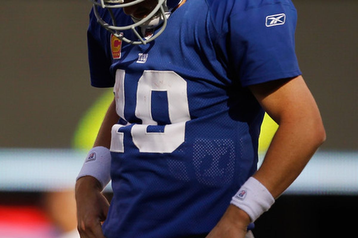 EAST RUTHERFORD, NJ - OCTOBER 09:  Eli Manning #10 of the New York Giants reacts against the Seattle Seahawks at MetLife Stadium on October 9, 2011 in East Rutherford, New Jersey.Seahawks defeated the Giants 36-25.  (Photo by Mike Stobe/Getty Images)