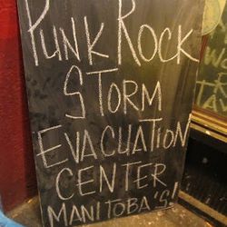 Manitoba's, the Punk Rock Storm Evacuation Center. [<a href="http://evgrieve.com/2012/10/at-punk-rock-storm-evacuation-center.html">EV Grieve</a>]