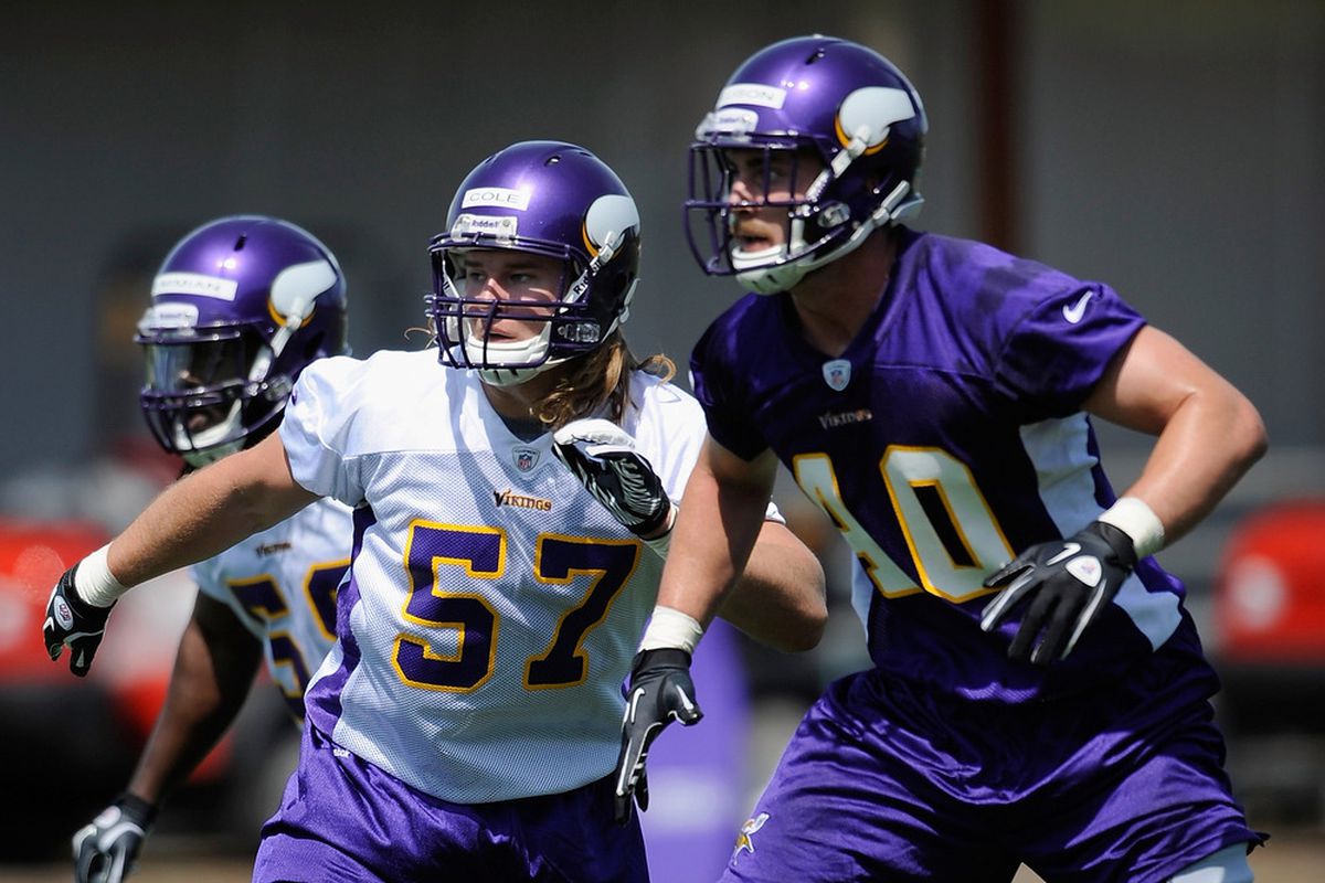 EDEN PRAIRIE, MN - MAY 4: Audie Cole #57 and Rhett Ellison #40 of the Minnesota Vikings run through a drill during a rookie minicamp on May 4, 2012 at Winter Park in Eden Prairie, Minnesota. (Photo by Hannah Foslien/Getty Images)