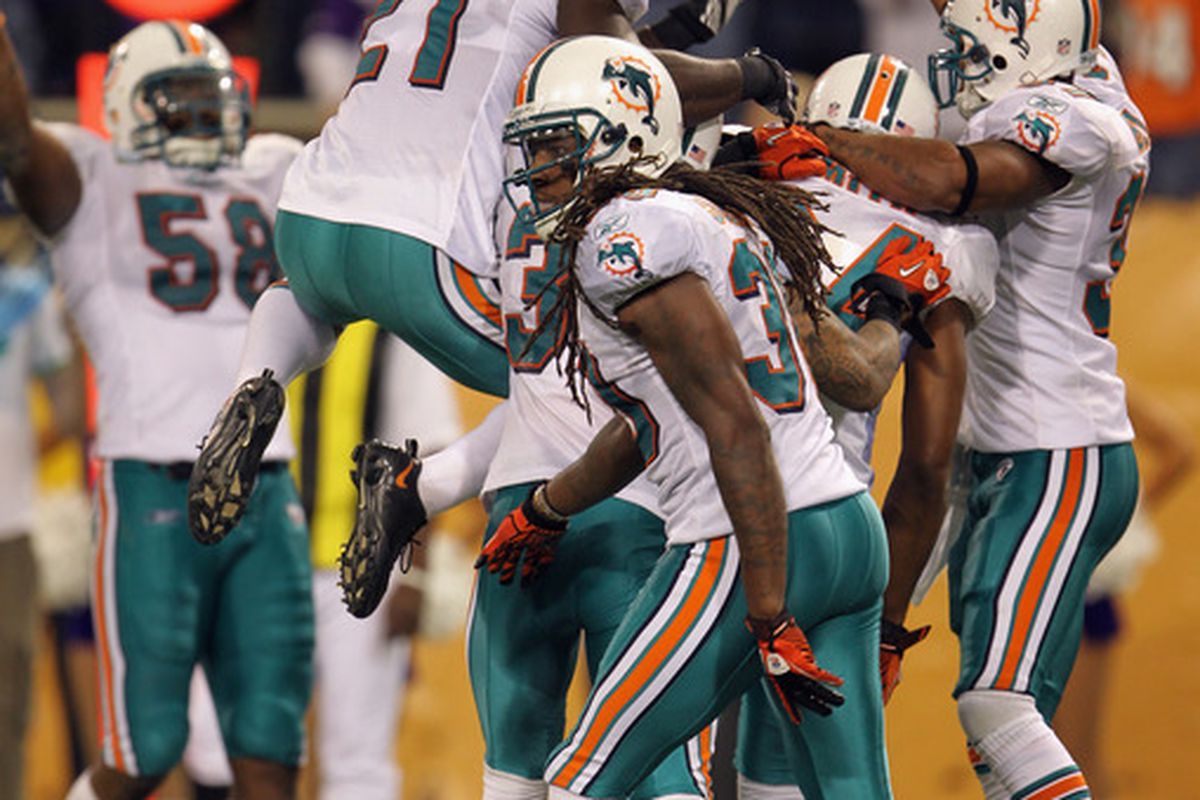 The defense celebrates after the big stop.