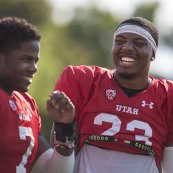 Running backs Devonta'e Henry-Cole, left, and Armand Shyne talk after a University of Utah football practice in Salt Lake City on Thursday, Aug. 3, 2017.