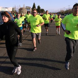 A huge crowd of runners participate in a 5K race to remember and support the victims of the Boston Marathon bombings, as Striders Running Store in Layton Monday, April 22, 2013.