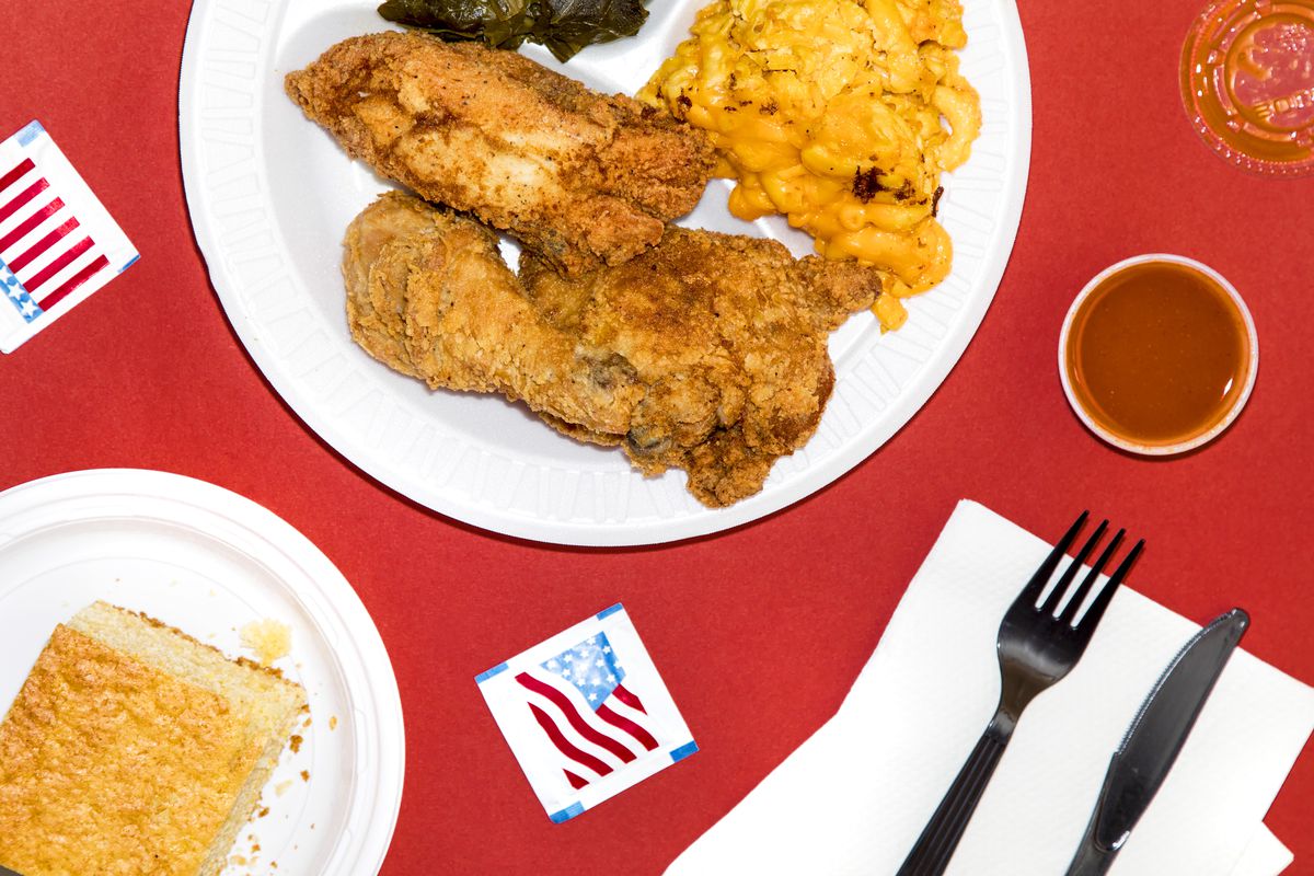 Fried chicken on a plate with two sides