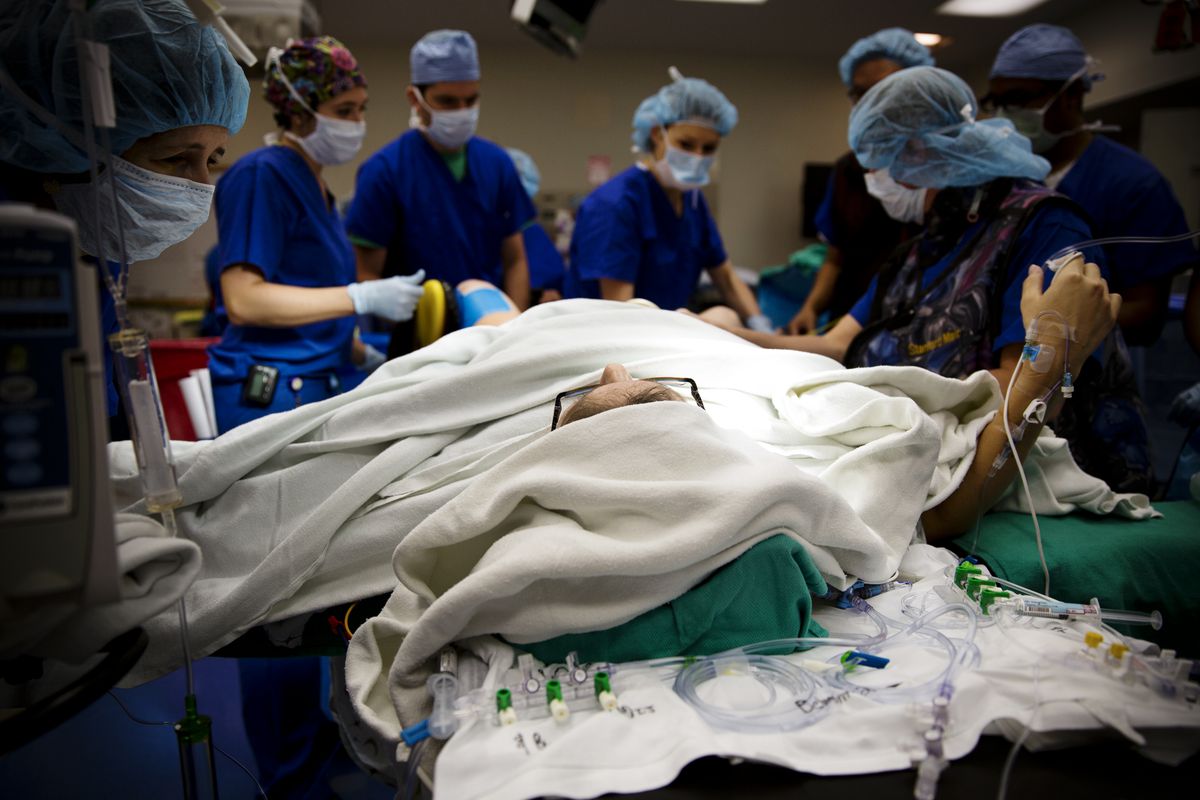 Terlizzi on the operating table at Stanford. More than 20 doctors and nurses shuffled in and out of her operating room to manage her complicated birth.