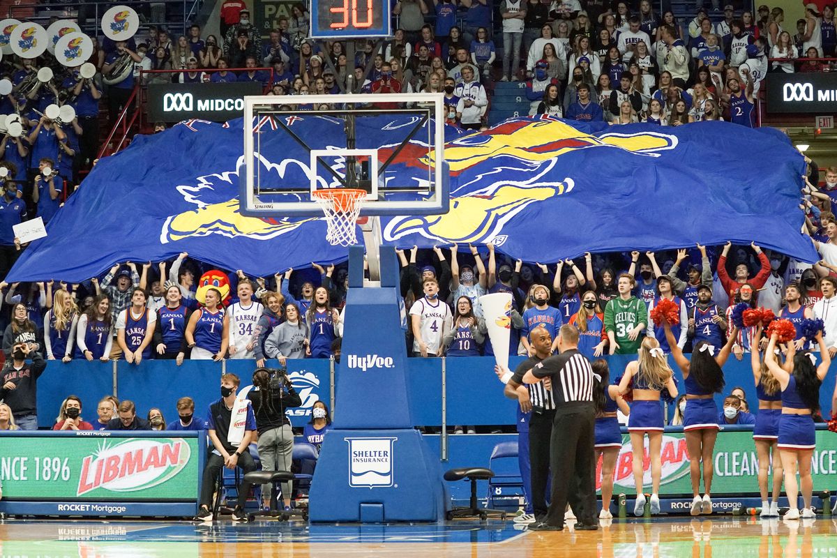 Kansas Jayhawks fans display a large flag against the Tarleton State Texans during the second half at Allen Fieldhouse.