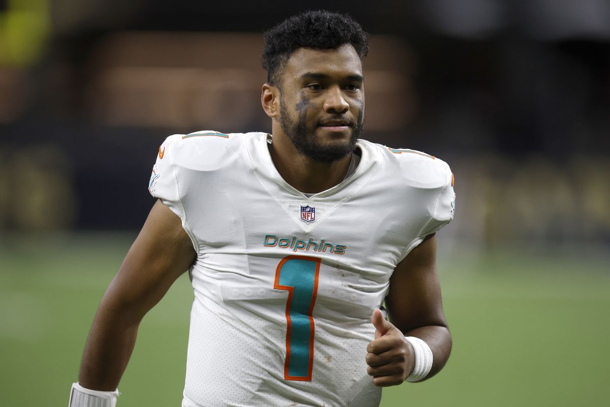 Tua Tagovailoa #1 of the Miami Dolphins reacts after defeating the New Orleans Saints at Caesars Superdome on December 27, 2021 in New Orleans, Louisiana.