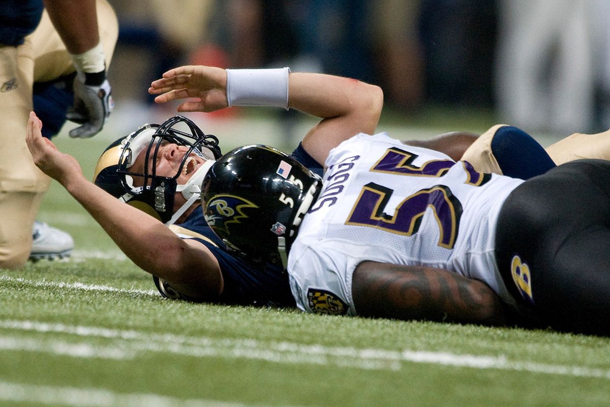 Sam Bradford #8 of the St. Louis Rams reacts after being sacked by Terrell Suggs #55 of the Baltimore Ravens at the Edward Jones Dome on September 25, 2011 in St. Louis, Missouri. The Ravens defeated the Rams 37-7. (Photo by Jeff Curry/Getty Images)