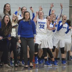 Fremont head coach Lisa Dalebout, center, and the rest of the Silverwolves' bench look downcourt following a play during Fremont's 61-47 victory against Bingham in the Class 6A state championship game at Salt Lake Community College in Taylorsville on Saturday, Feb. 24, 2018.