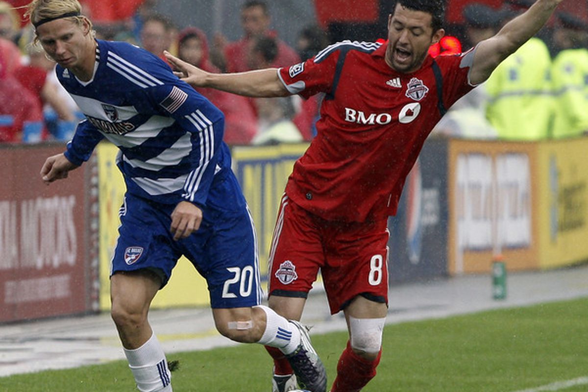 TORONTO - JULY 24: Dan Gargan #8 of Toronto FC battles for the ball with Brek Shea #20 of FC Dallas at BMO Field during a MLS game July 24 2010 in Toronto Ontario Canada. (Photo by Abelimages/Getty Images)
