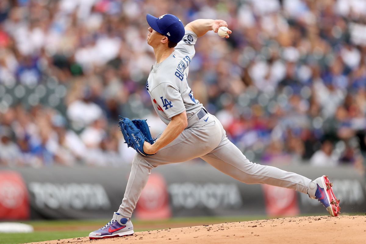 Starting pitcher Walker Buehler #21 of the Los Angeles Dodgers throws against the Colorado Rockies in the first inning at Coors Field on July 17, 2021 in Denver, Colorado.
