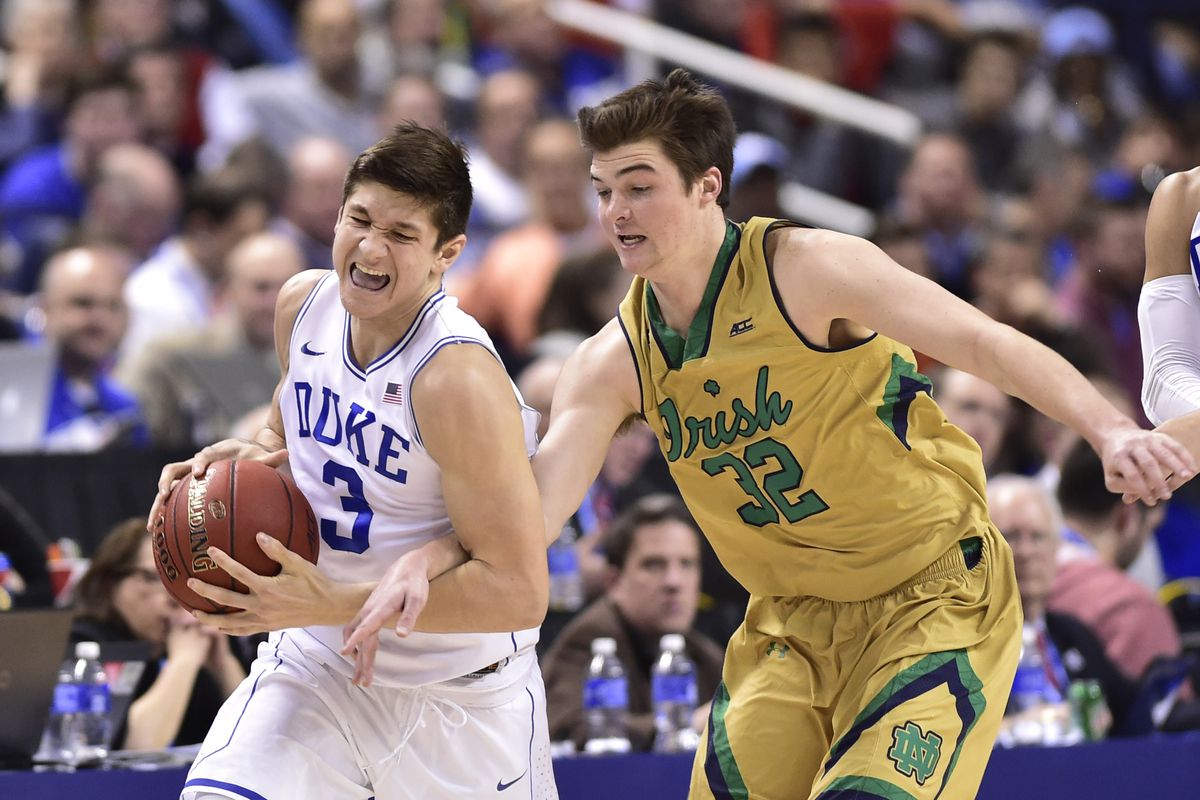 Mar 13, 2015; Greensboro, NC, USA; Duke Blue Devils guard Grayson Allen (3) with the ball as Notre Dame Fighting Irish guard Steve Vasturia (32) defends in the first half during the semifinals of the ACC Tournament at Greensboro Coliseum.