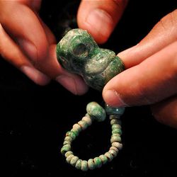A jade monkey figurine was one of many jewels found inside a tomb in the ancient city of Chiapa de Corzo, Chiapas, Mexico. Archaeologists believe this is one of the oldest pyramid tombs in Mesoamerica, dating back nearly 2,700 years.