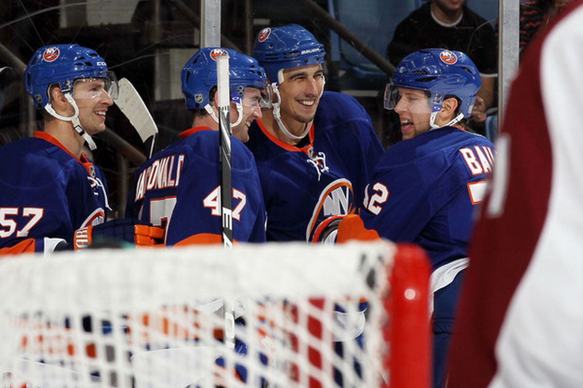 I had to go three pages back in the photo editor to find happy Islanders pictures. (No, I don't count Parenteau celebrating his goal in a 7-1 rout as a happy picture.)