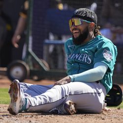 Feb 24, 2023; Peoria, Arizona, USA; Seattle Mariners shortstop J.P. Crawford (3) reacts after getting thrown out trying to score in the second inning against the San Diego Padres at Peoria Sports Complex