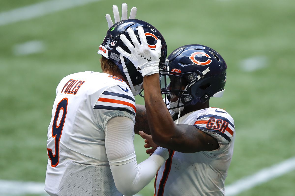 Anthony Miller celebrates his touchdown with Nick Foles of the Chicago Bears in the fourth quarter of an NFL game against the Atlanta Falcons at Mercedes-Benz Stadium on September 27, 2020 in Atlanta, Georgia.