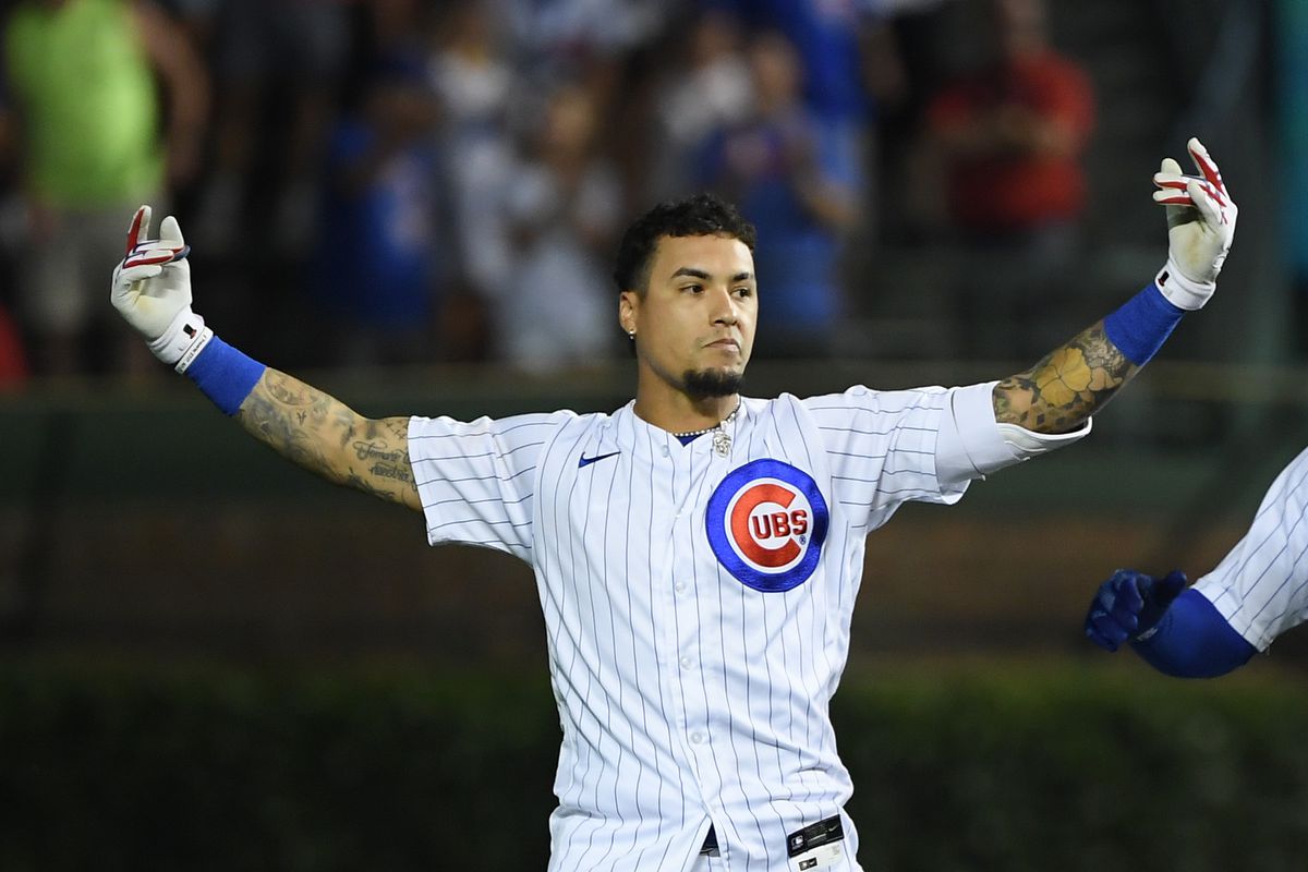 Javier Baez of the Chicago Cubs reacts after his walk off single in the ninth inning against the Cincinnati Reds at Wrigley Field on July 26, 2021 in Chicago, Illinois.